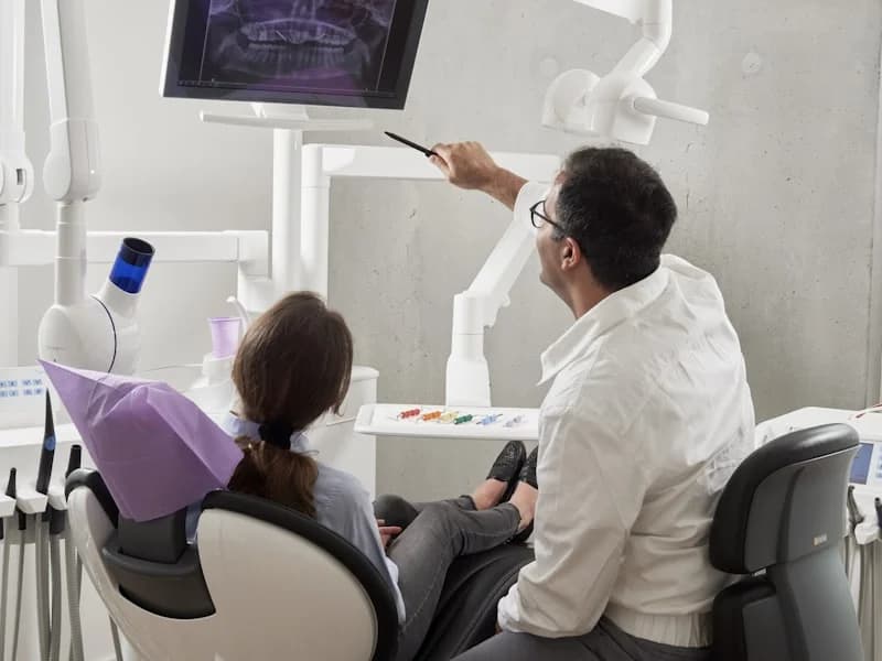 Patient after dental implant treatment Greater Noida